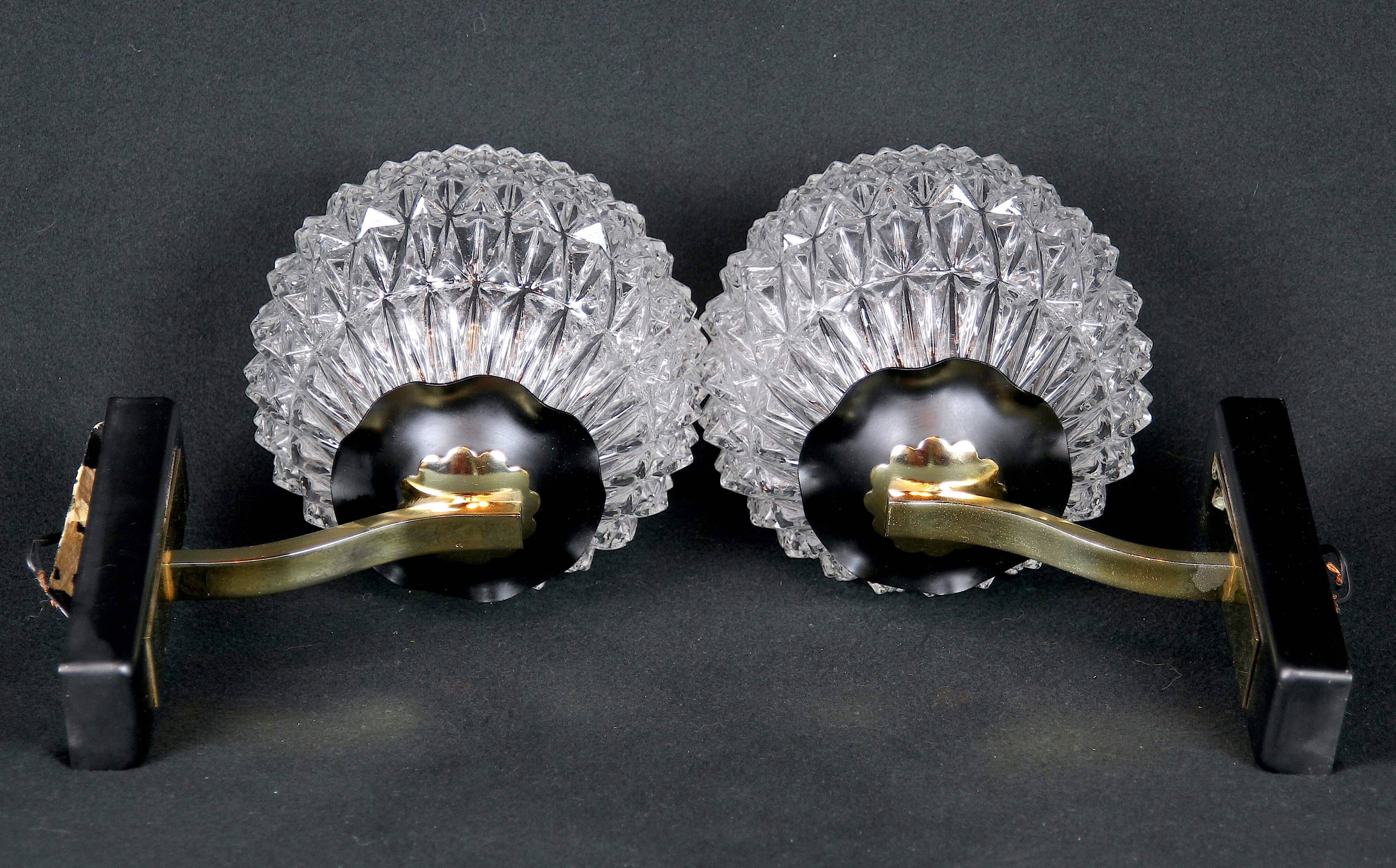 Maison Arlus Pair of brass and black wall sconces, France Mid-Century