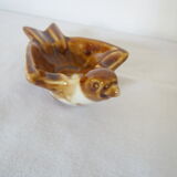 Empty pocket or ashtray model bird