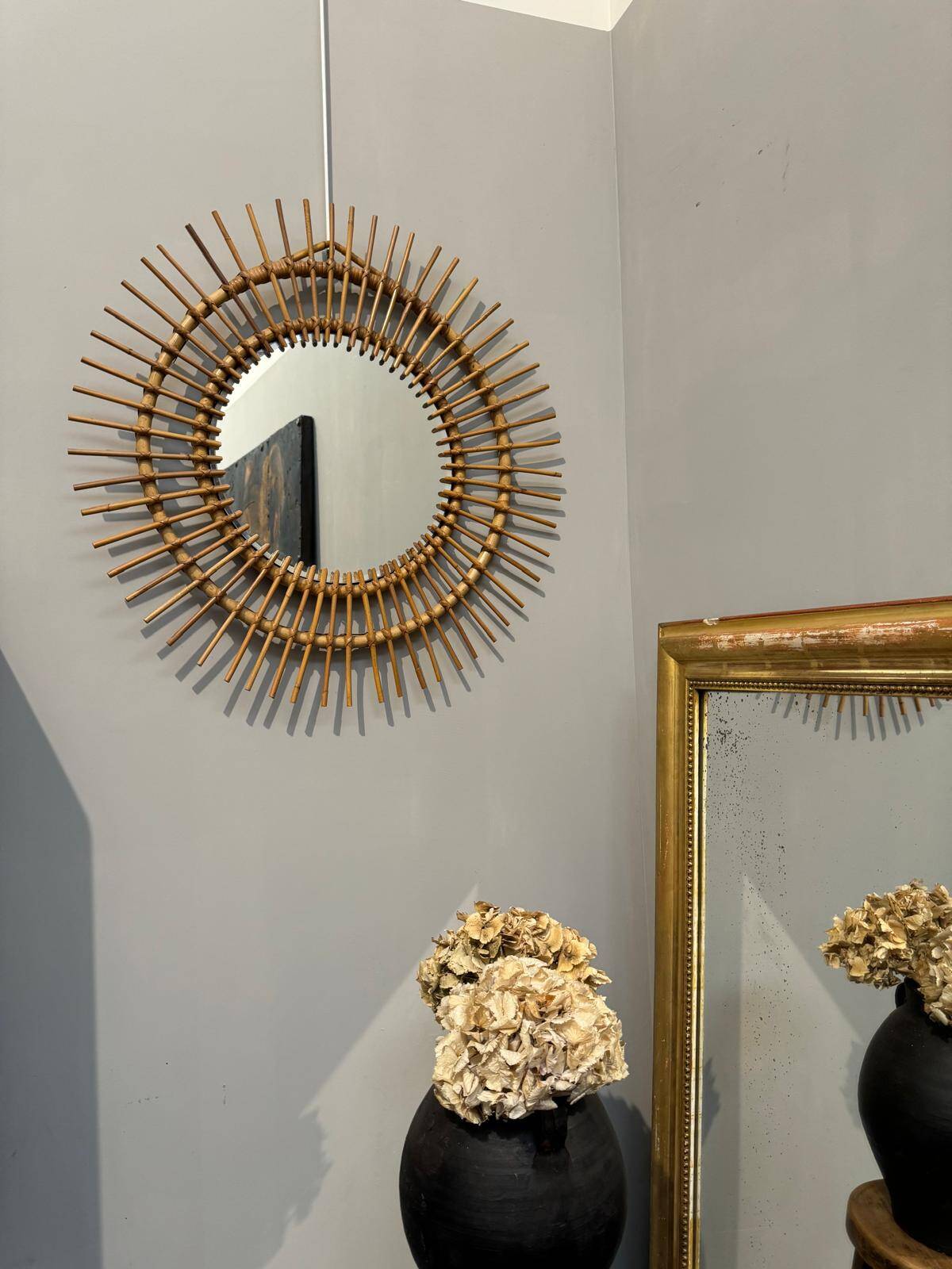 Vintage rattan sun mirror