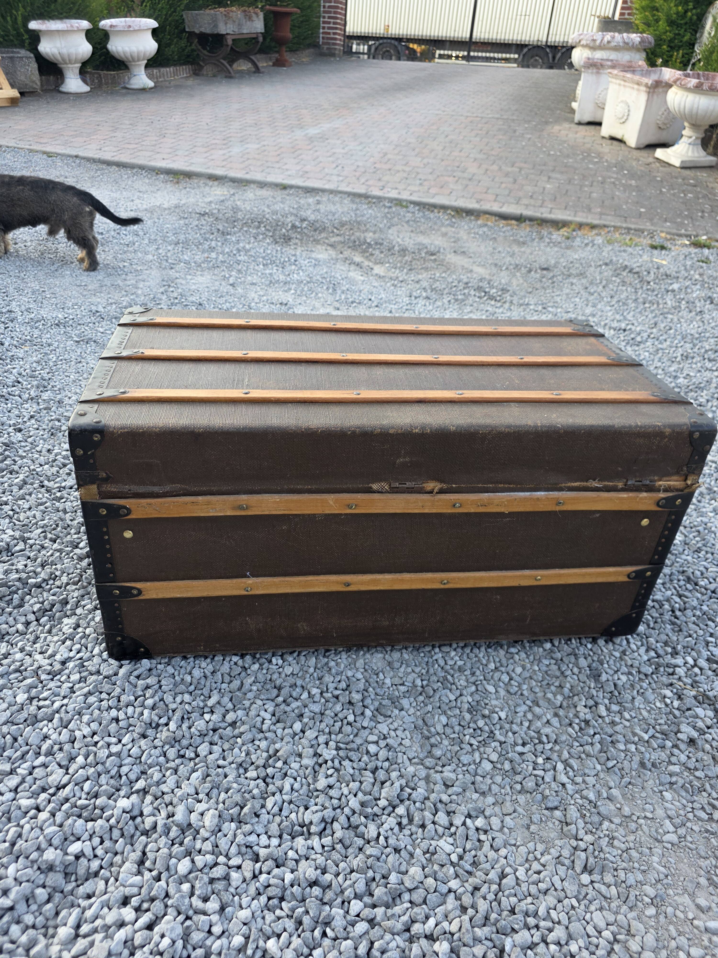 Old travel trunk in oilcloth