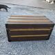 Old travel trunk in oilcloth