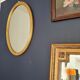 Large oval mirror gilded wood with red plate 44x66cm
