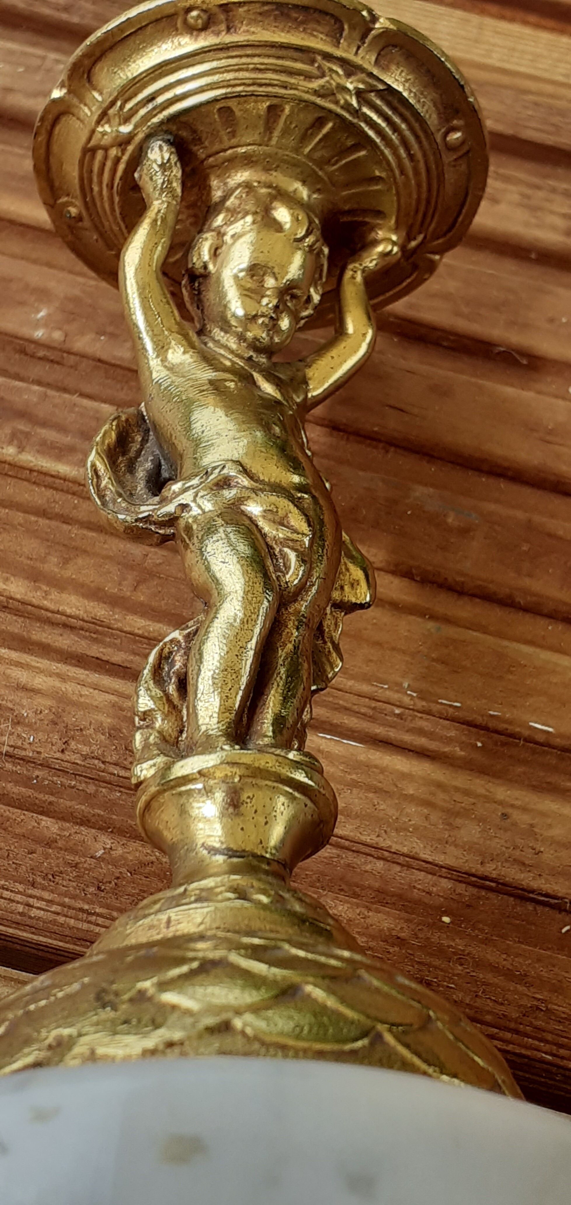cherubic bronze lamp foot on marble base