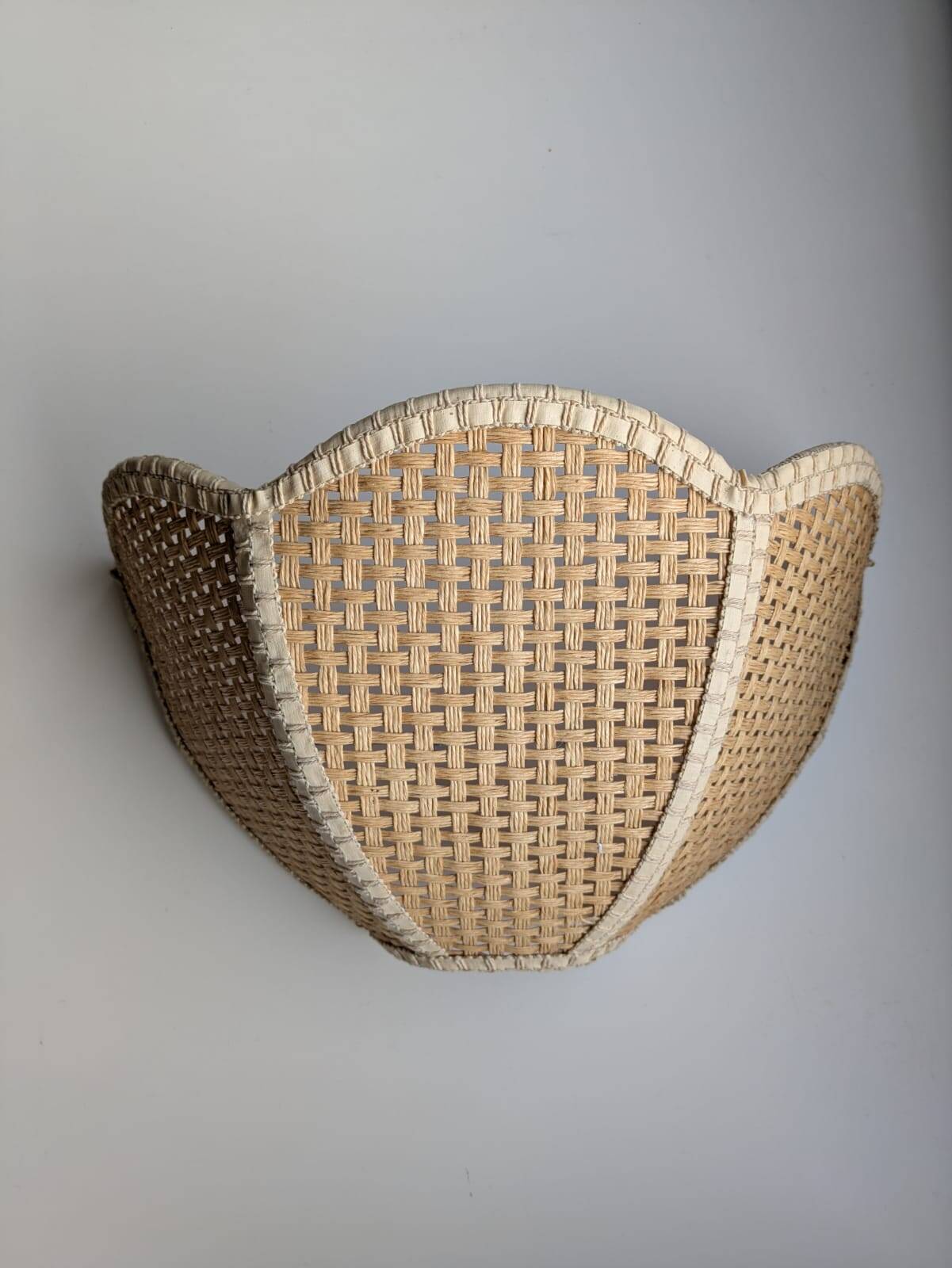 Pair of shell sconces in braided raffia