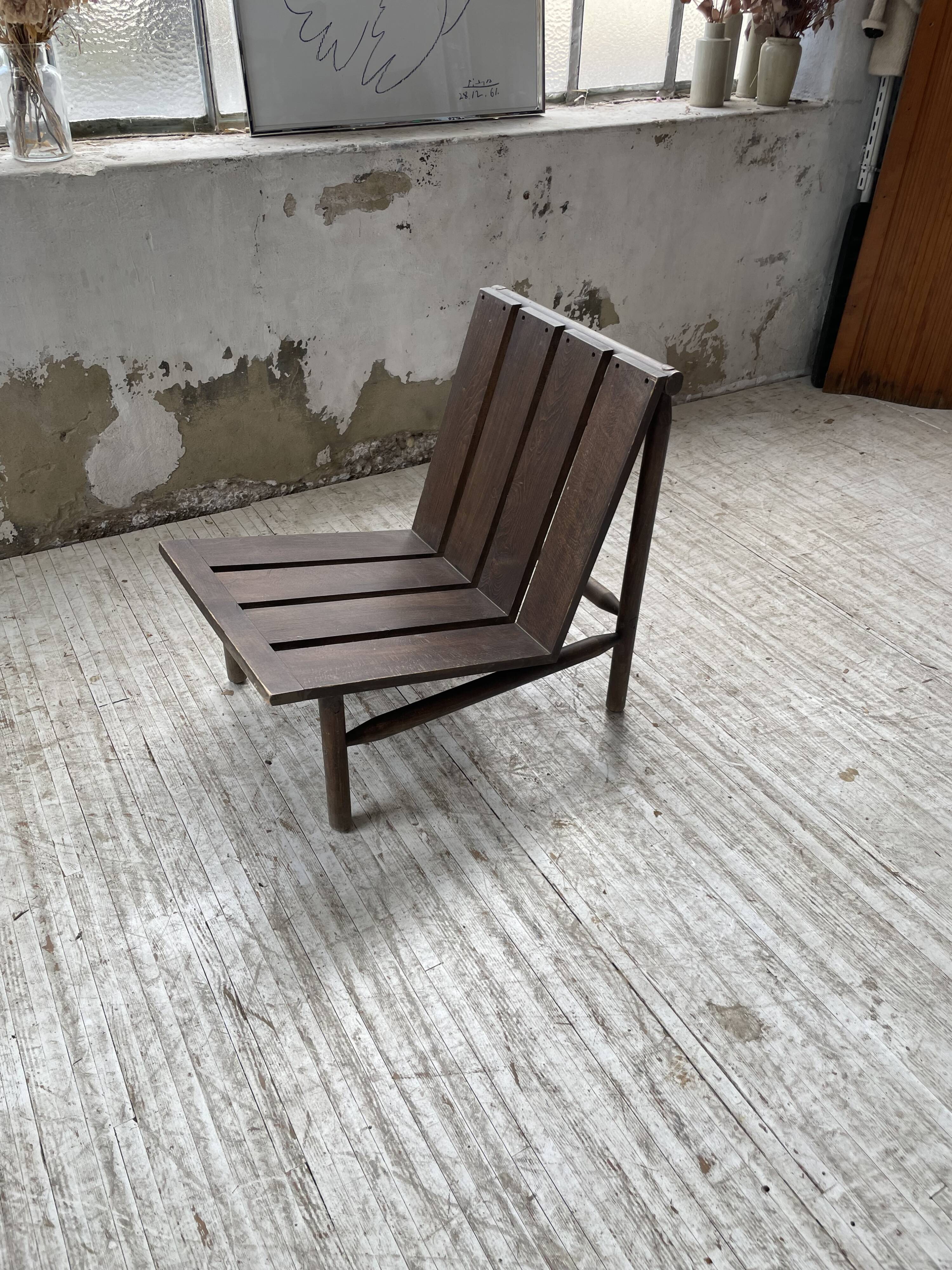 Modernist oak armchair
