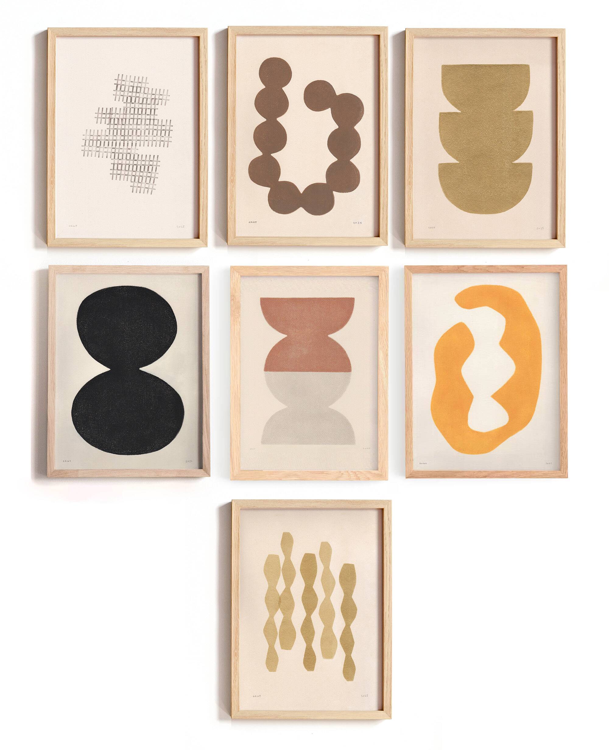 Collection of 12 framed paintings in warm/cool colours.