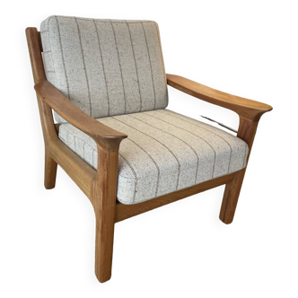 Solid teak armchair by Juul Kristensen