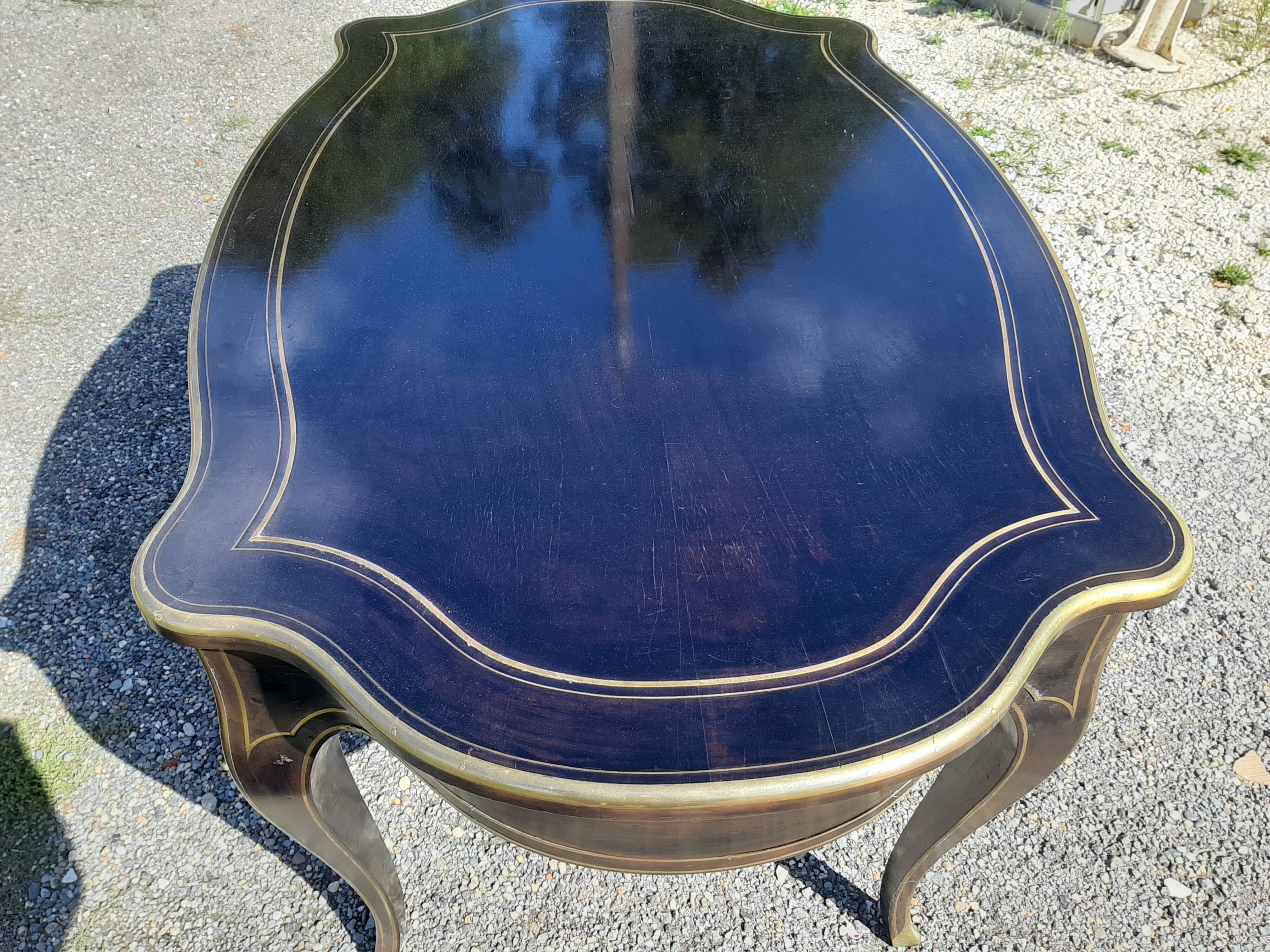 Napoleon III black lacquered wood and brass table