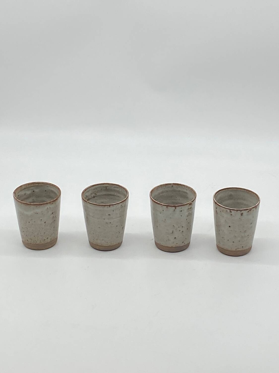 Set of 4 Roger Jacques stoneware tumblers / glass, vintage