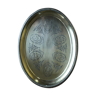 Oval tray in chiseled brass