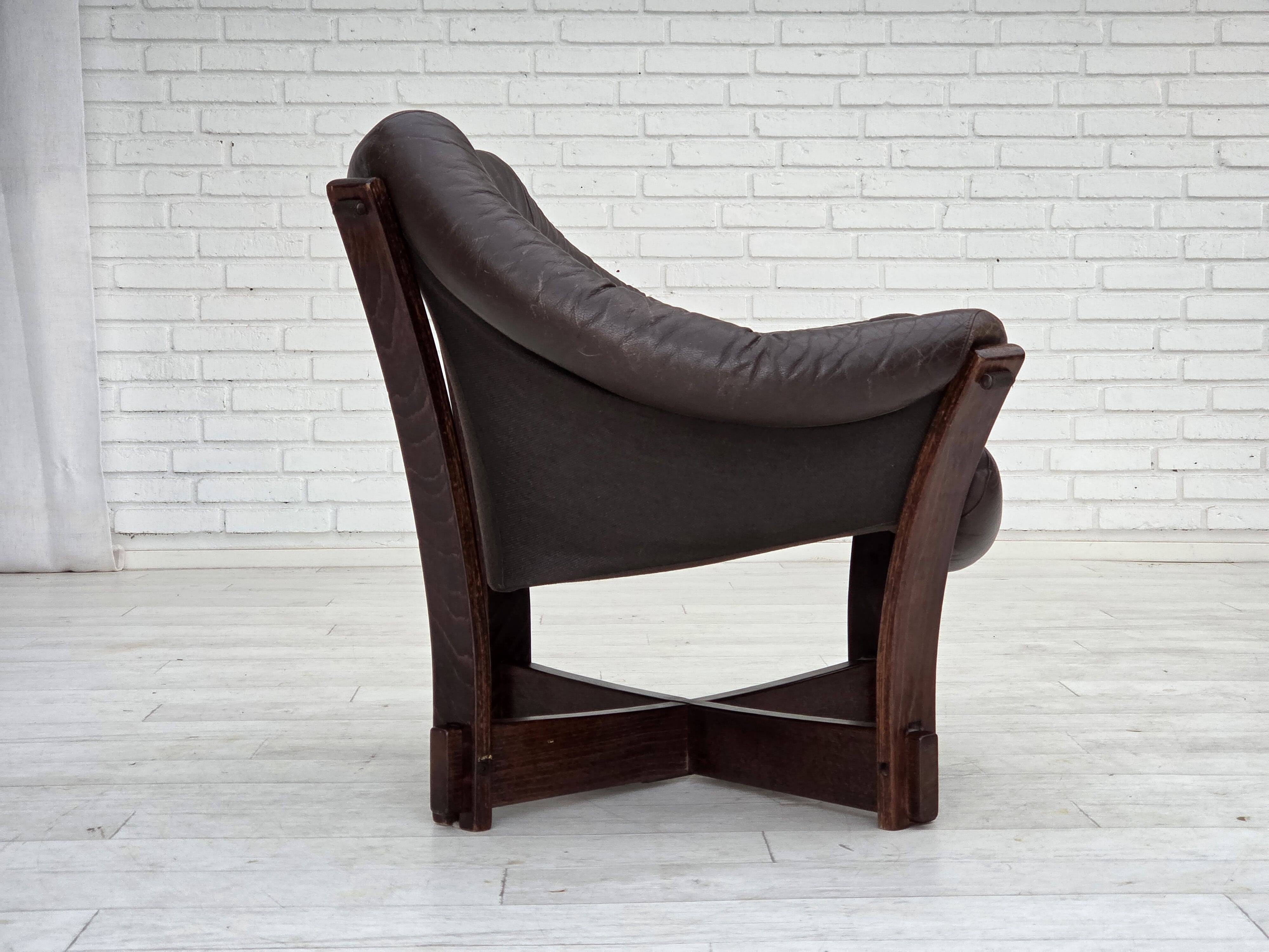 1970s, Scandinavian lounge chair, furniture leather, oak wood.