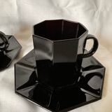 Set of 2 arcoroc black glass coffee cups with underplates