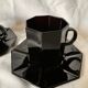 Set of 2 arcoroc black glass coffee cups with underplates