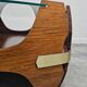 Mid-century coffee table in curved plywood with a glass top, 1940s.