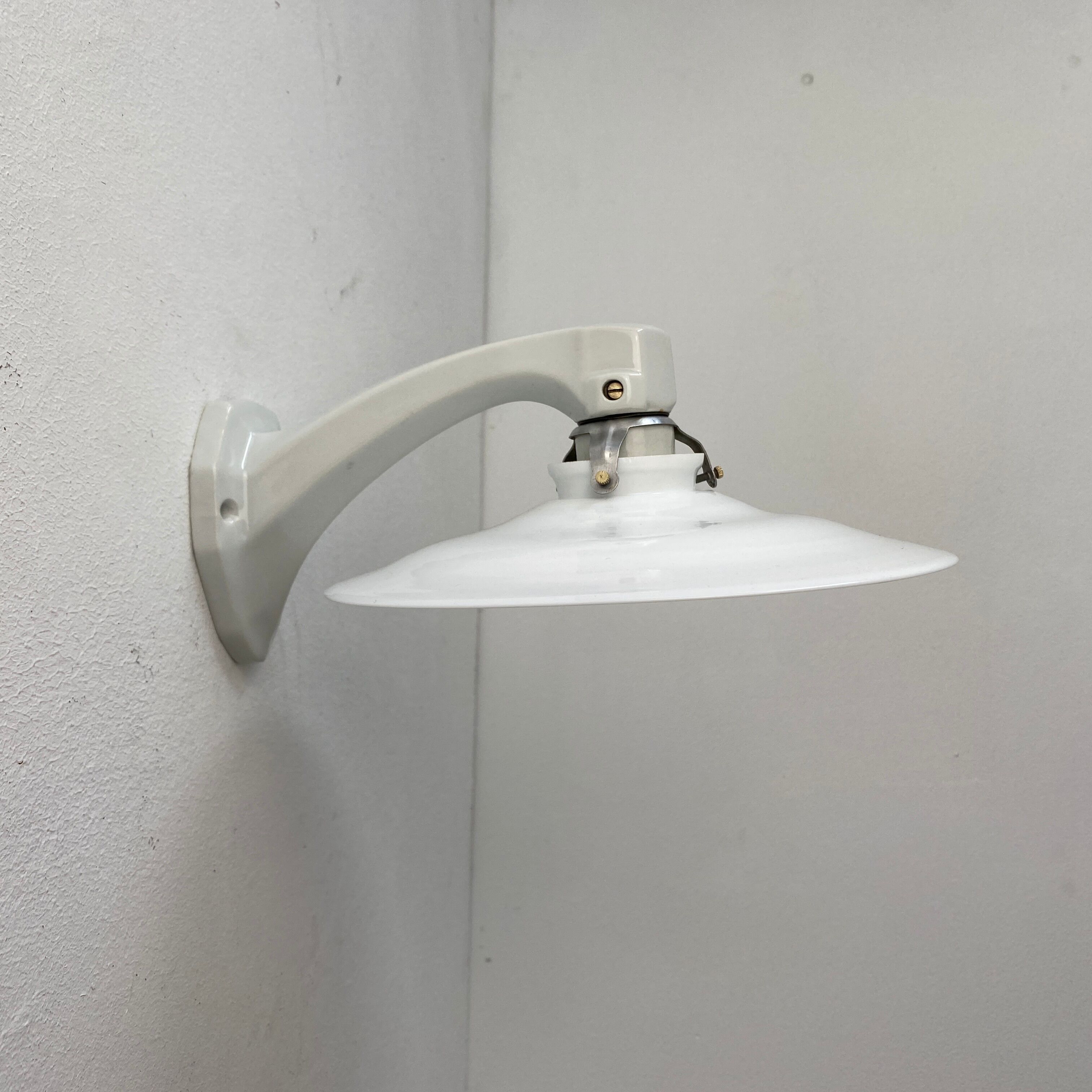 Old ceramic and opaline vintage wall lamp
