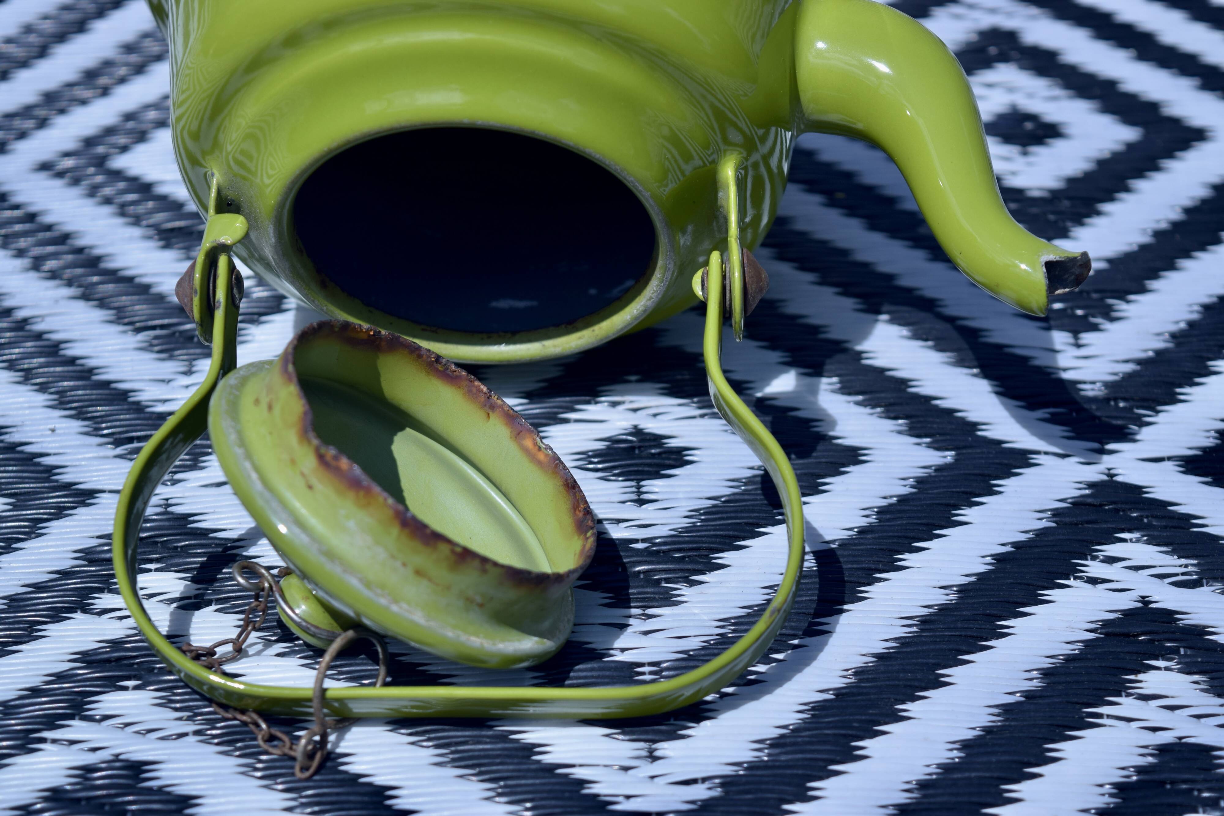 Vintage green enameled sheet metal kettle