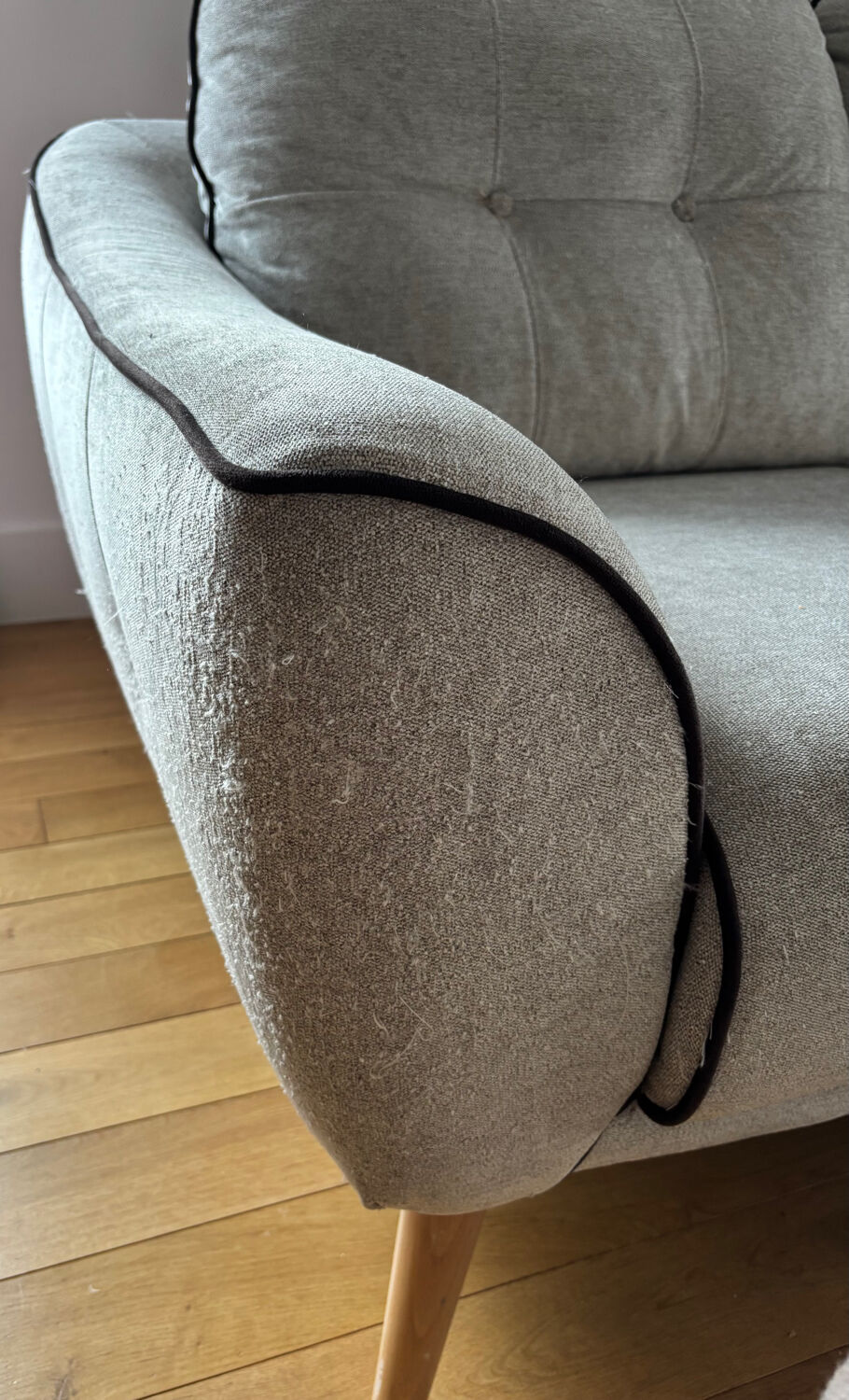 Grey two-seater sofa