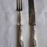 Couvert à gigot en métal argenté.