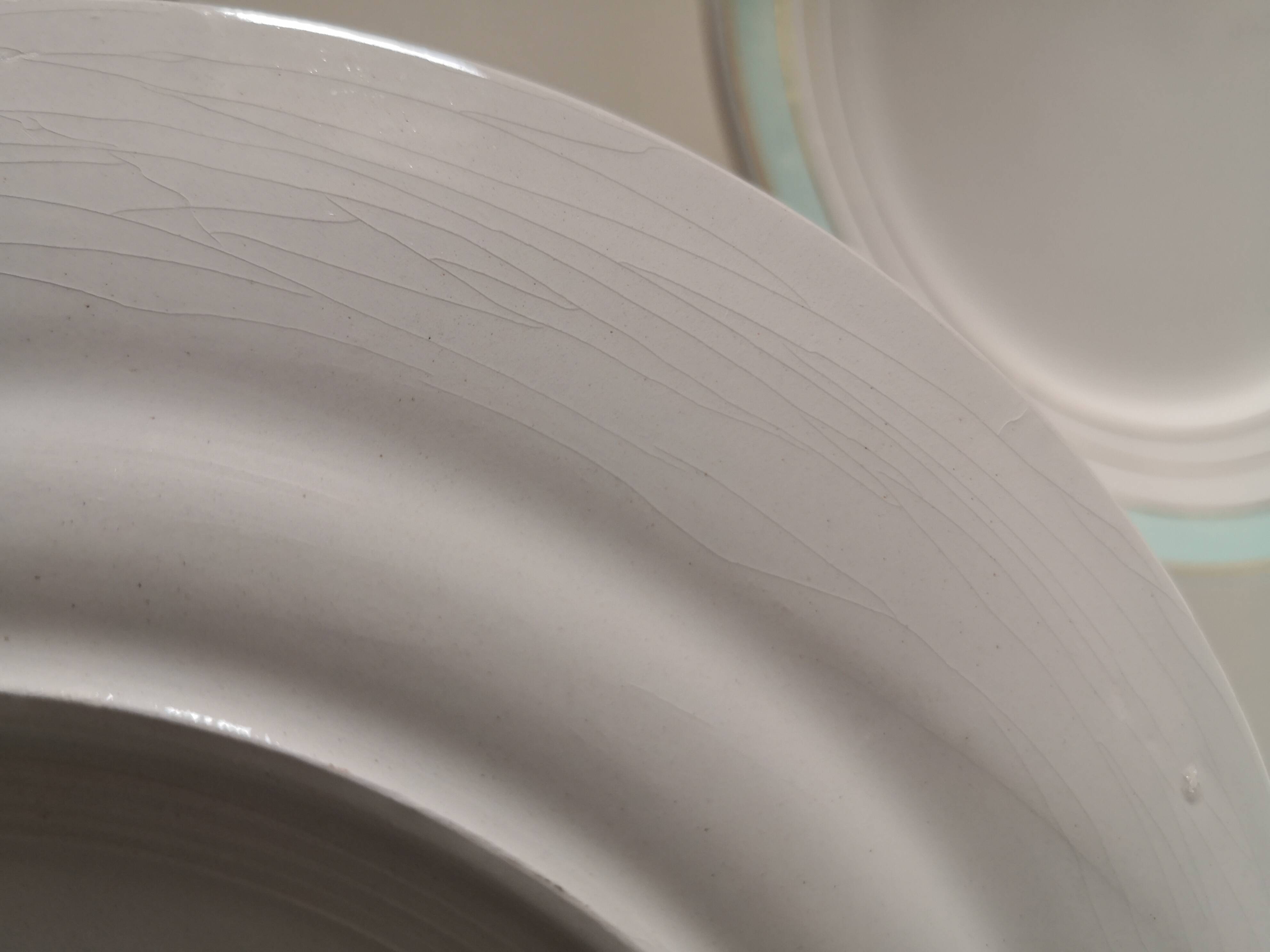 set of 9 green, white and gold Luneville plates