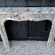 Regency-style fireplace in grey Ardennes marble from around 1900.