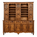 Clockside cabinet from the Louis XV period in walnut and elm, fully carved.