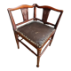 Corner armchair in wood and leather art deco style