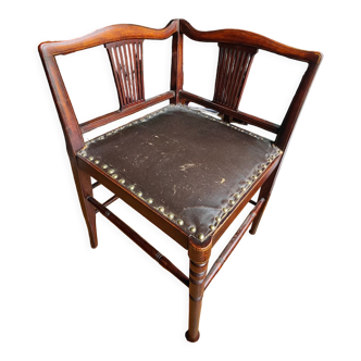 Corner armchair in wood and leather art deco style