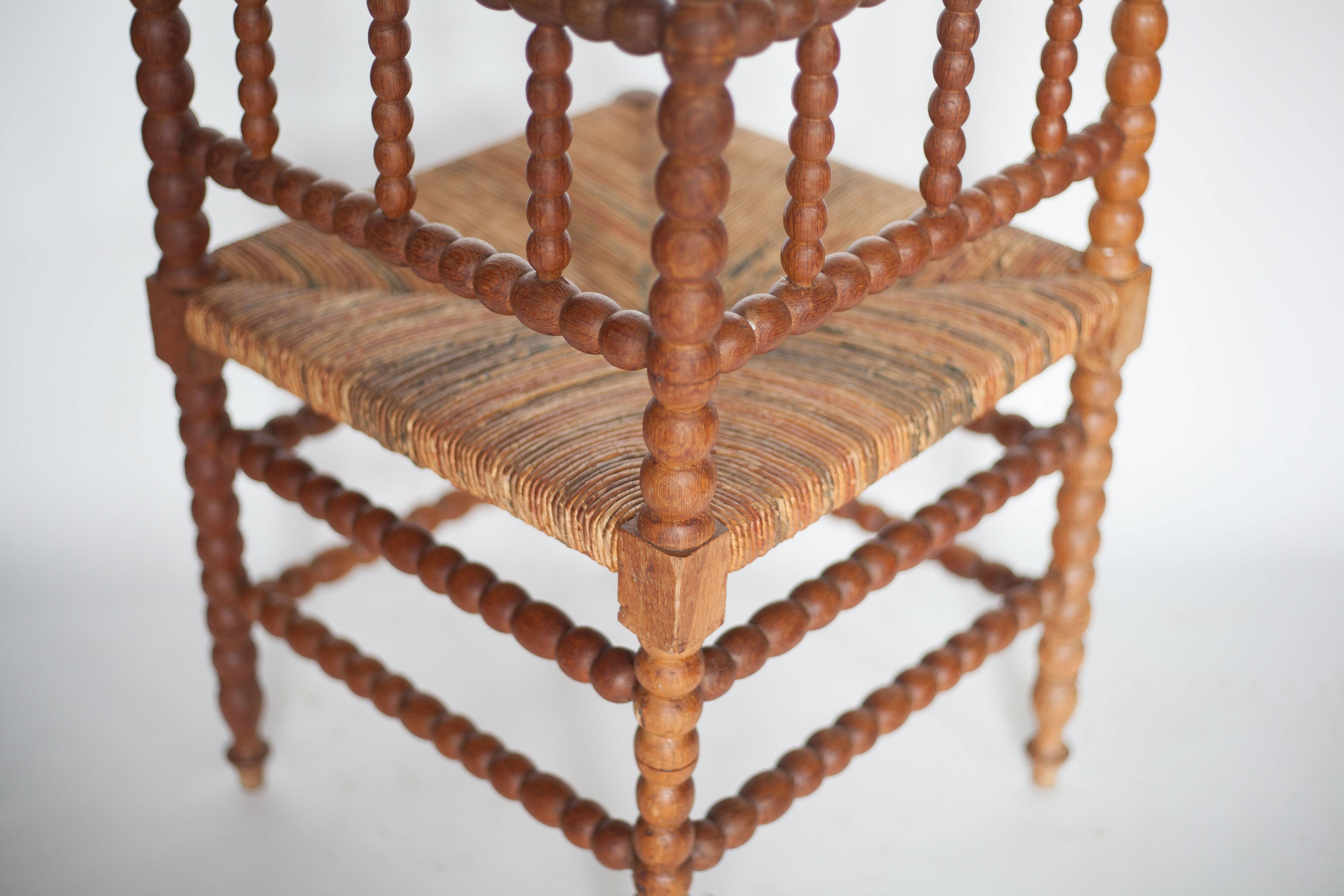 Wooden and caned corner chair, antique bobbin chair, occasional chair.