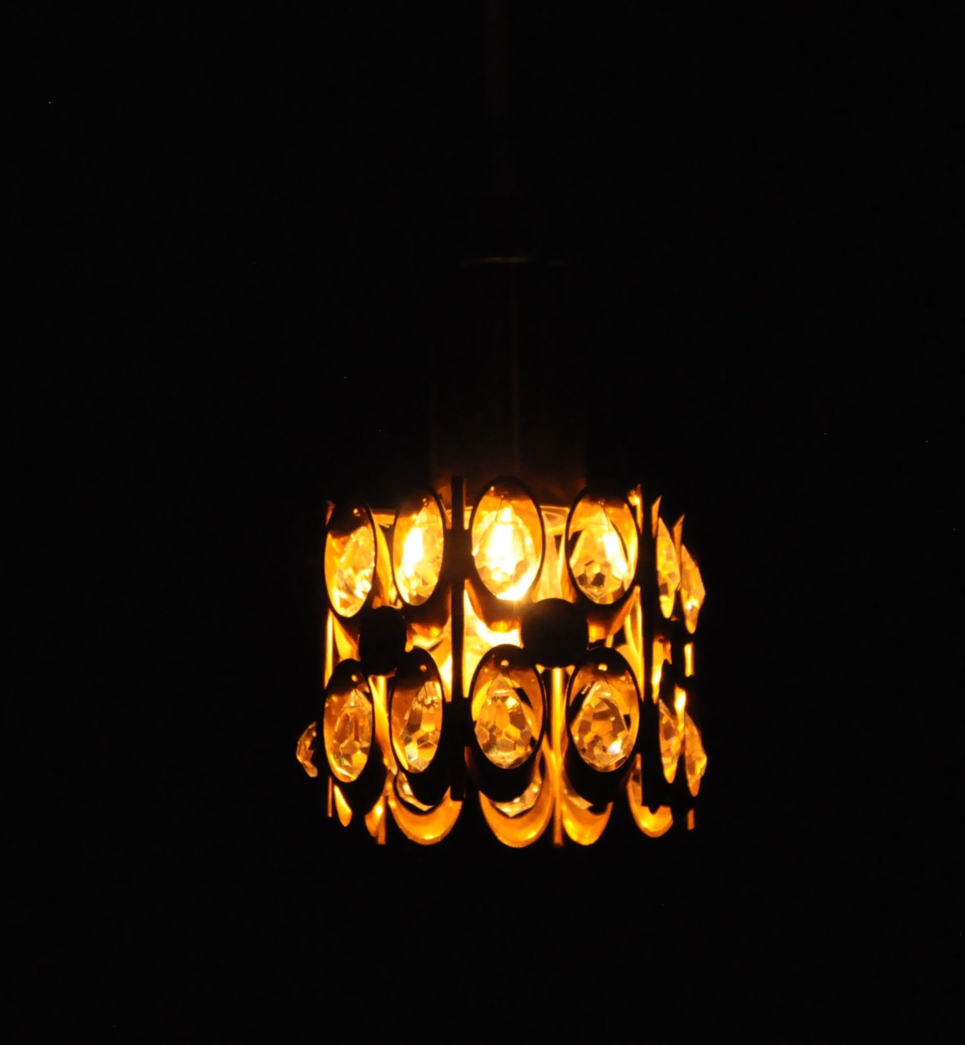 Ceiling lamp in the Hollywood Regency style. Golden.