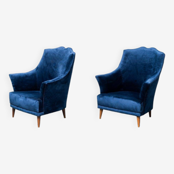 Paire de fauteuils en velours bleu
