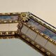 Octagonal Faceted Mirror with Brass Garlands — French Work, Glass