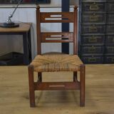 Children's wooden chair with straw seat