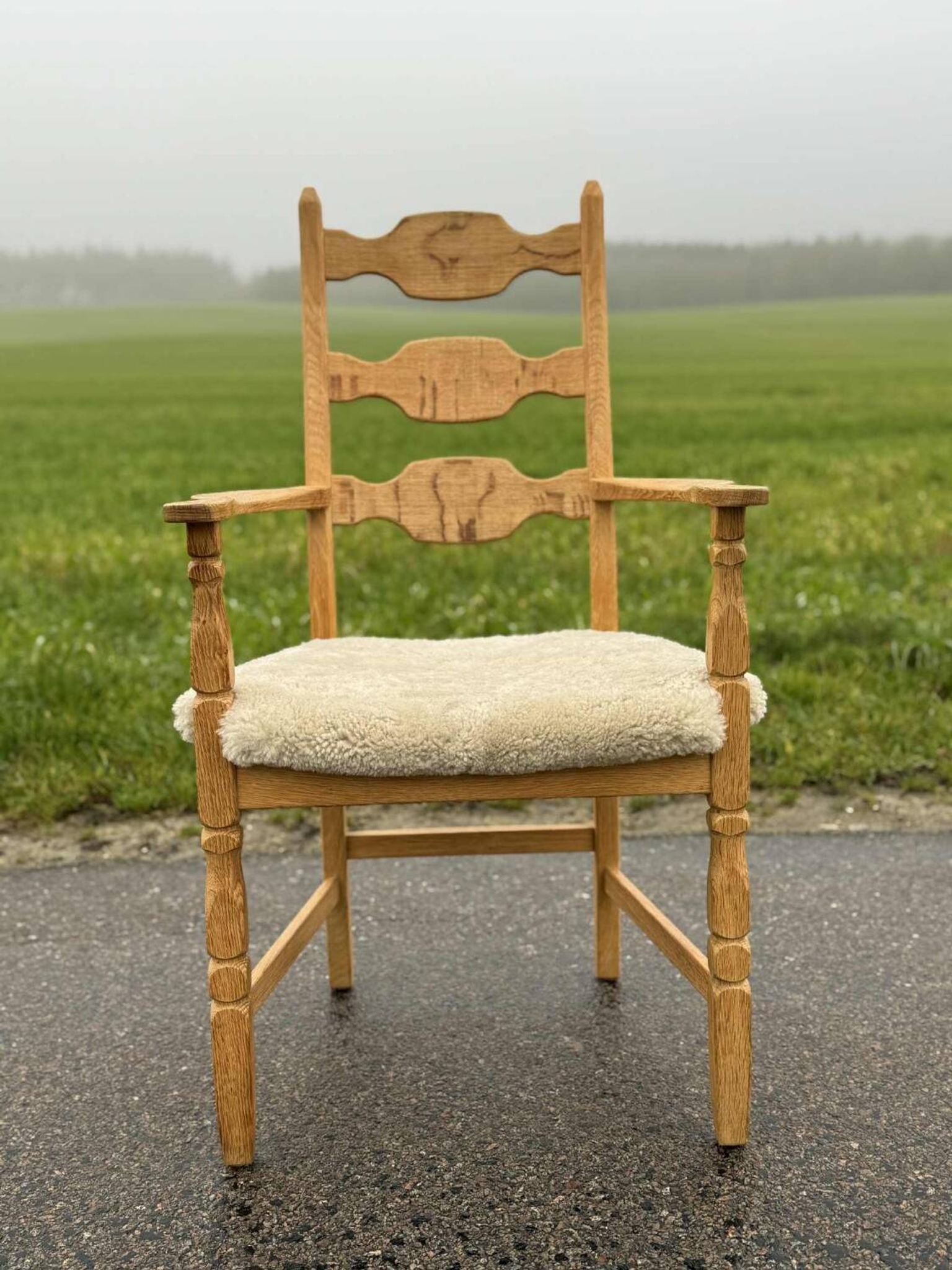 Henning Kjaernulf high back chair with new lambswool