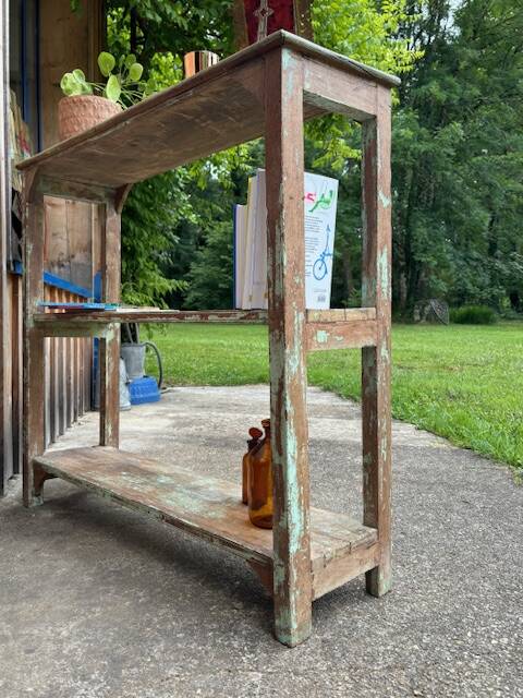 Teak shelves with a green patina