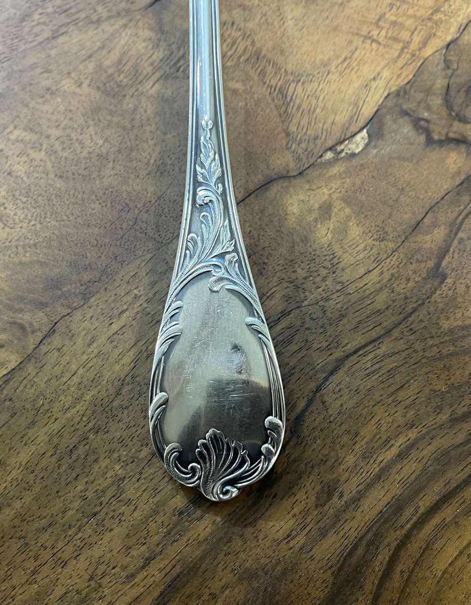 Series of 12 Christofle model Marly dessert spoons in silver metal