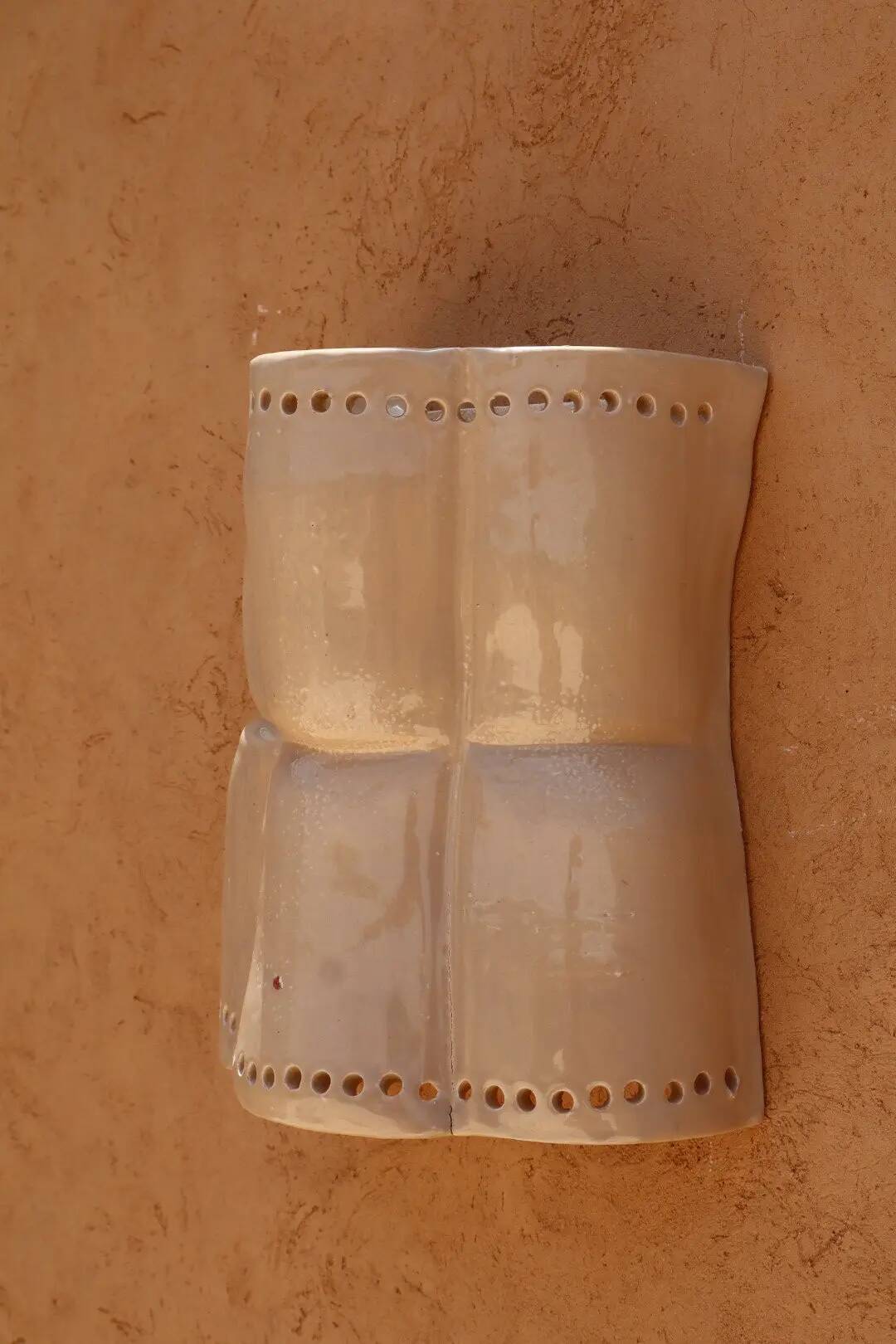 Sculptural ceramic wall light