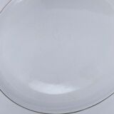 Round serving dish with small flower pattern and silver border