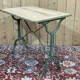 Bistro table from the beginning of the 20th century, oak top and cast iron base