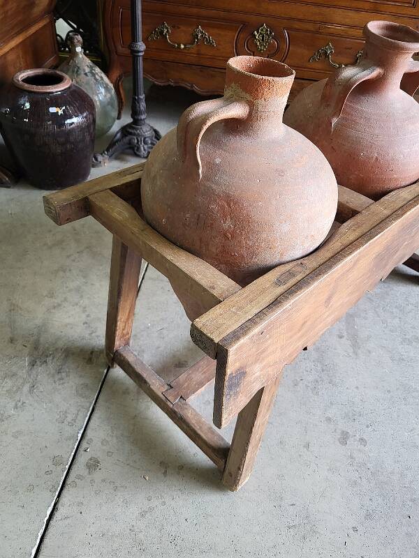 Old wooden jar holder with 3 clay jars