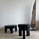 Black mango wood tripod side table with a semi-spherical top, height: 45 cm, diameter: 44 cm.