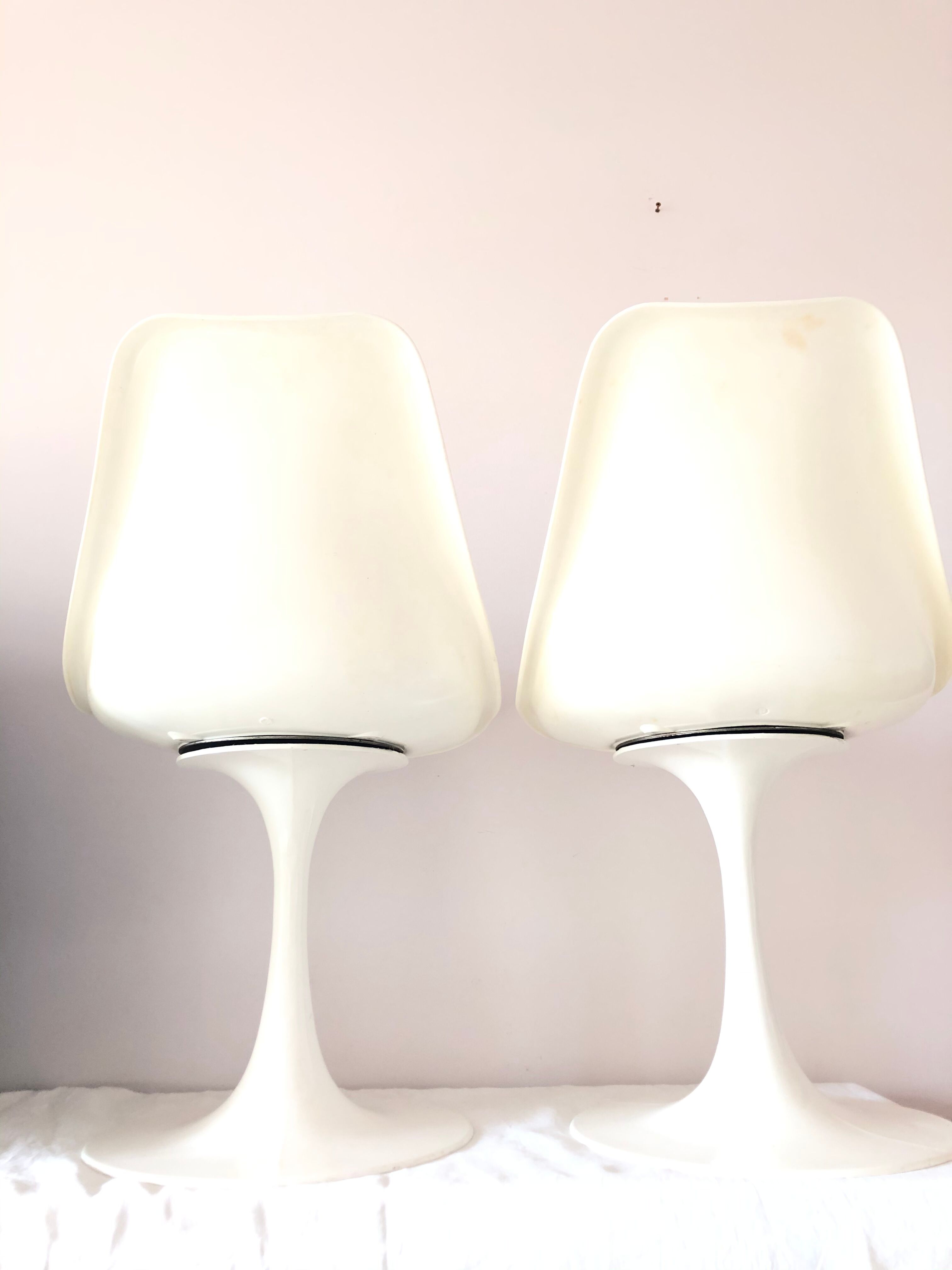 Pair of vintage tulip foot swivel chairs