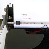 Hermes 2000 portable typewriter with its carrying suitcase