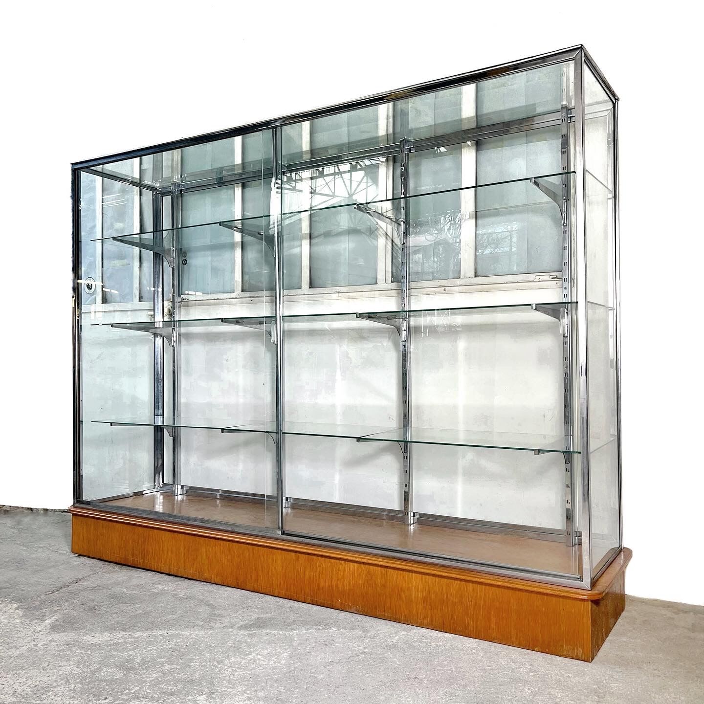 Glass & chrome showcase, 1980