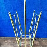 Neoclassical brass magazine rack. Maison Jansen. 1940s.