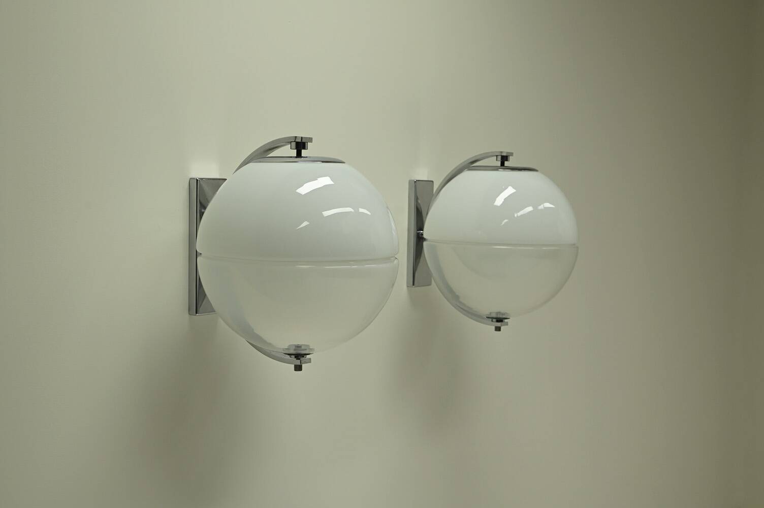 Set of 2 rare large globe wall lamps, 1960s Italy.