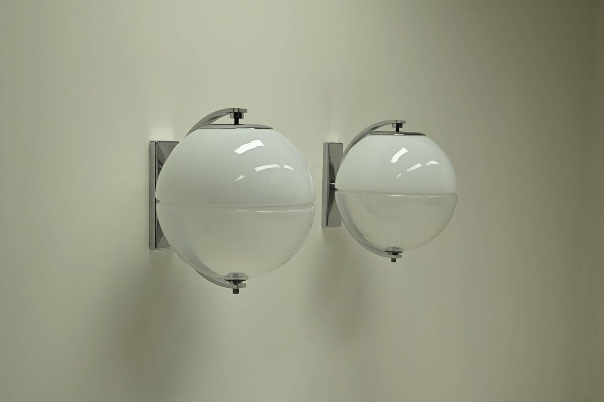 Set of 2 rare large globe wall lamps, 1960s Italy.