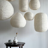 Suspension in rattan and natural japanese linen in the shape of a drop