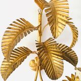 Golden palm leaf sconce