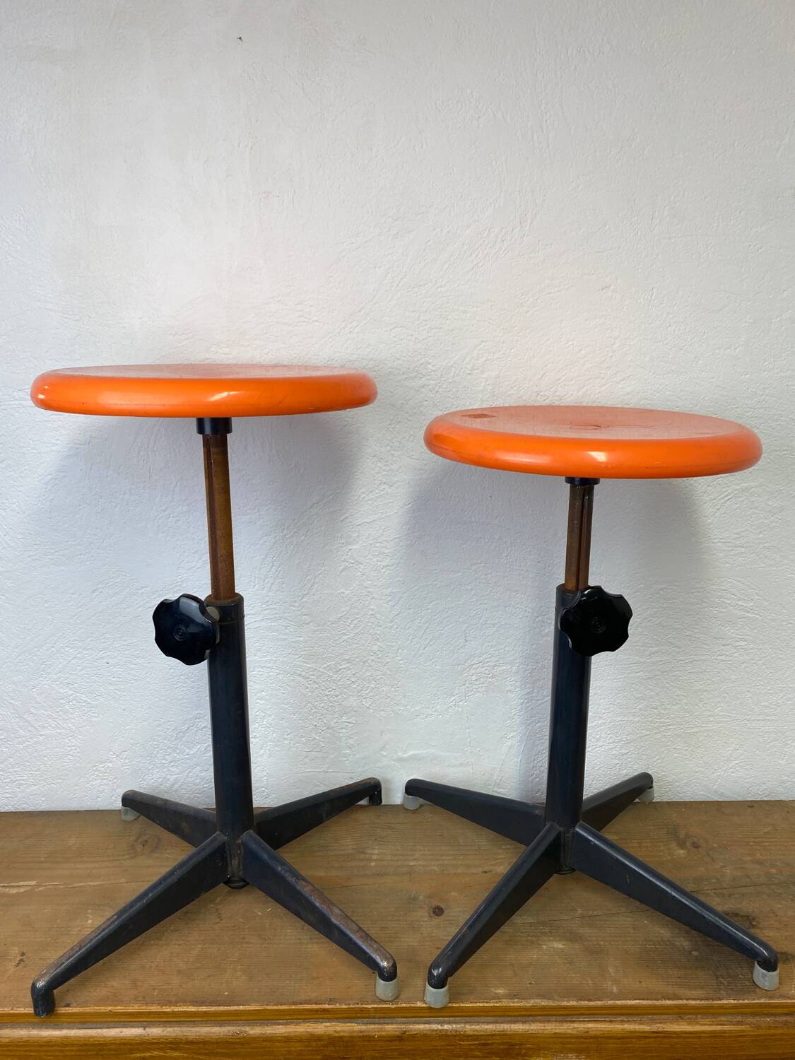 Two vintage industrial stools