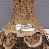 Small beautiful ceramic table lamp in earth colors.